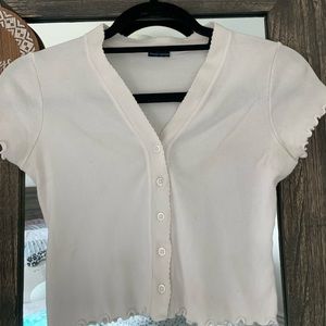 white button top with ruffles